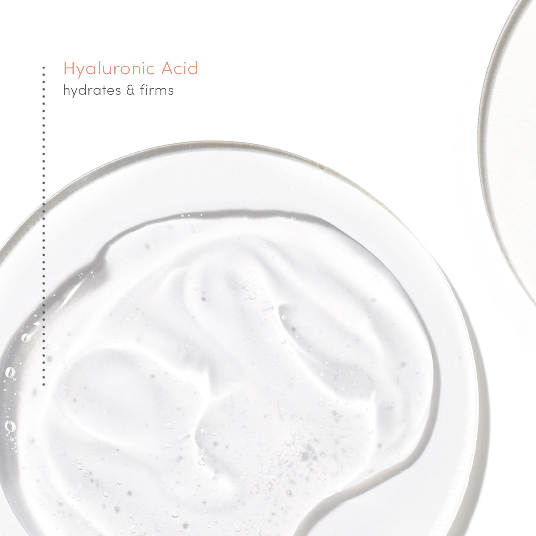 Close-up of a skincare product with hyaluronic acid text on a white background