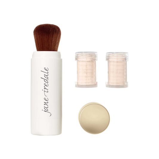 Makeup brush, container of powder, and jar of loose powder on a white background with 'jane iredale' branding.