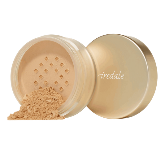 Open container of Amazing Base® Loose Mineral Powder SPF 20/15 with visible brand name on a white background