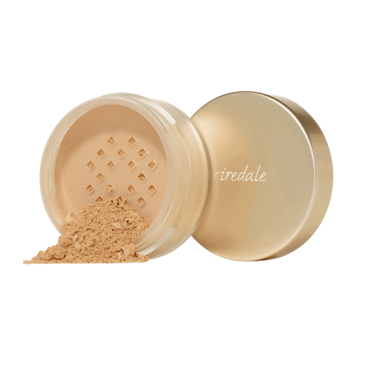 Open container of Amazing Base® Loose Mineral Powder SPF 20/15 with visible brand name on a white background