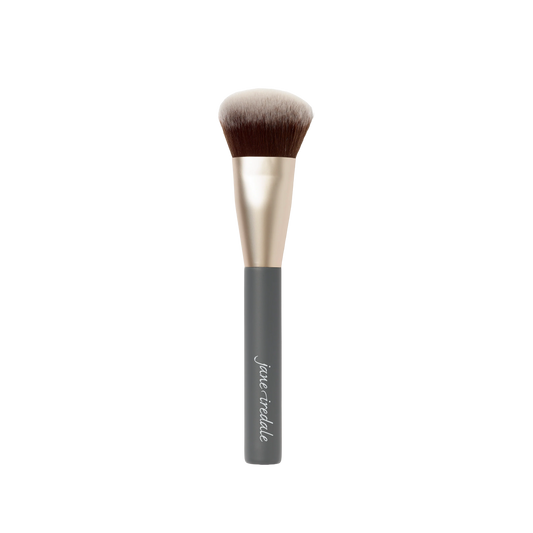Jane Iredale Multiuse Blending Brush with sloped bristles for applying and blending creams, liquids, and powders
